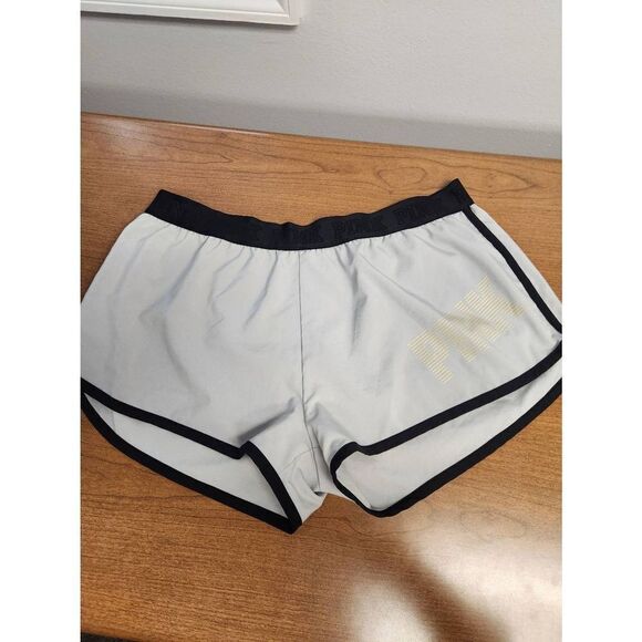 Pink LARGE grey shorts with black trim and PINK made out of Zebra font in yellow - Picture 1 of 7